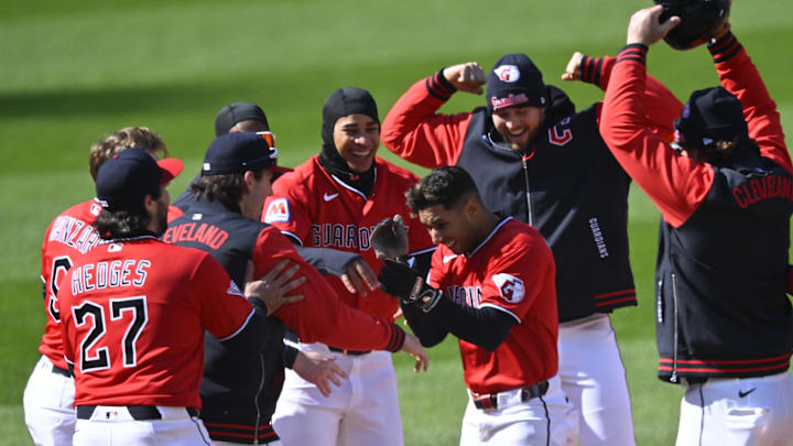 Apr 7, 2026: Cleveland Guardians shortstop Brayan Rocchio (4) celebrates his game-winning hit with his teammates after a win over the Kansas City Royals at Progressive Field. 
