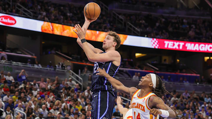 Orlando Magic forward Franz Wagner (22) goes to the basket against Atlanta Hawks guard Terance Mann (14) during the second half at Kia Center.