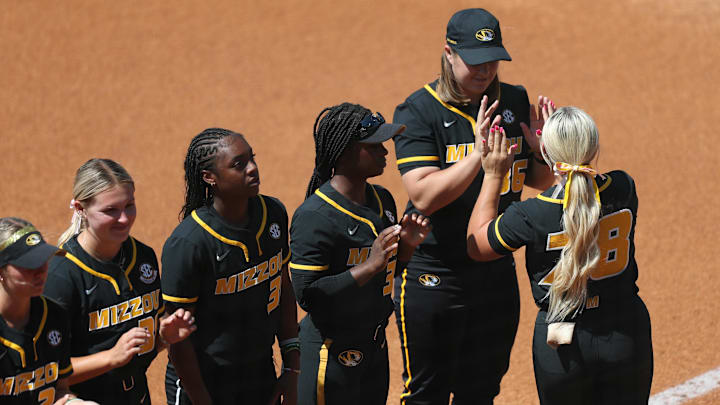 May 6, 2025; Athens, GA, USA; Missouri teammates during introductions before a game against Ole Miss at Jack Turner Softball Stadium. Mandatory Credit: Mady Mertens-Imagn Images
