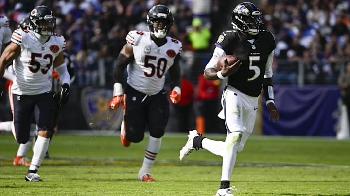 Quarterback Tyler Huntley scrambles away from T.J. Edwards and Grady Jarrett last Sunday in a 30-16 Bears loss.