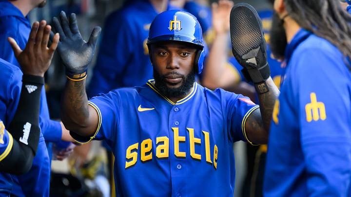 Jul 31, 2026; Seattle, Washington, USA; Seattle Mariners left fielder Randy Arozarena (56) celebrates in the dugout after scoring a run against the Minnesota Twins during the first inning at T-Mobile Park. Mandatory Credit: Steven Bisig-Imagn Images Jul 31, 2026; Seattle, Washington, USA; Seattle Mariners left fielder Randy Arozarena (56) celebrates in the dugout after scoring a run against the Minnesota Twins during the first inning at T-Mobile Park. Mandatory Credit: Steven Bisig-Imagn Images