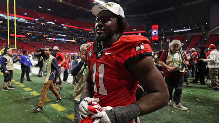 Dec 7, 2024; Atlanta, GA, USA; Georgia Bulldogs linebacker Jalon Walker (11) reacts after defeating the Texas Longhorns in overtime in the 2024 SEC Championship game at Mercedes-Benz Stadium. Mandatory Credit: Brett Davis-Imagn Images