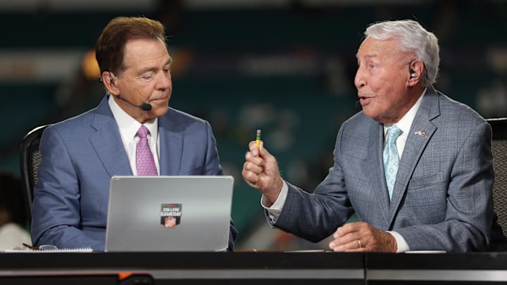 Jan 9, 2025; Miami, FL, USA; ESPN analysts Nick Saban and Lee Corso before the game between the Notre Dame Fighting Irish and the Penn State Nittany Lions at Hard Rock Stadium. 