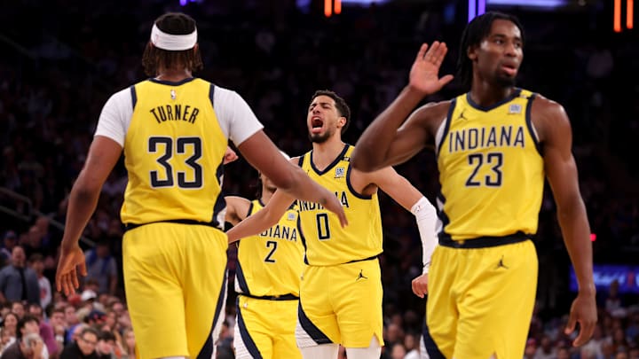 May 19, 2024; New York, New York, USA; Indiana Pacers guard Tyrese Haliburton (0) reacts with center Myles Turner (33) and guard Andrew Nembhard (2) and forward Aaron Nesmith (23) during the second quarter of game seven of the second round of the 2024 NBA playoffs at Madison Square Garden. Mandatory Credit: Brad Penner-Imagn Images May 19, 2024; New York, New York, USA; Indiana Pacers guard Tyrese Haliburton (0) reacts with center Myles Turner (33) and guard Andrew Nembhard (2) and forward Aaron Nesmith (23) during the second quarter of game seven of the second round of the 2024 NBA playoffs at Madison Square Garden. Mandatory Credit: Brad Penner-Imagn Images