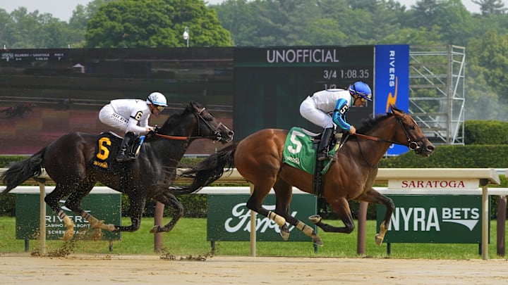 Jun 7, 2025; Saratoga, NY, USA; Book’em Danno (5) with Paco Lopez up wins Race 7 - True North Stakes over Mullikin (6) with Flavien Prat up at Saratoga Race Course. 