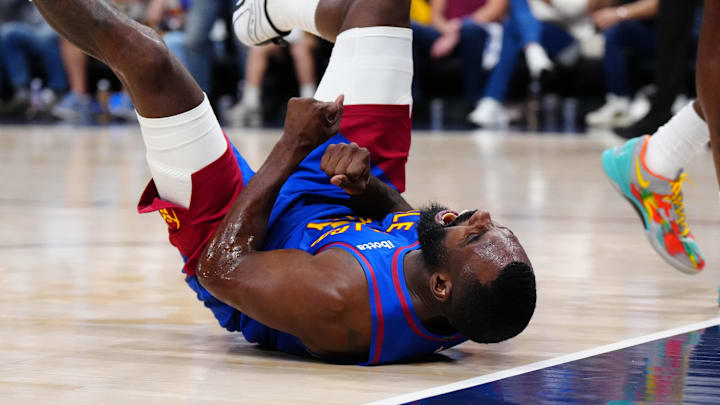 Apr 20, 2026; Denver, Colorado, USA; Denver Nuggets guard Tim Hardaway Jr. (10) reacts to a charging foul called on Minnesota Timberwolves in the first half during game two of the first round of the 2026 NBA Playoffs at Ball Arena. Mandatory Credit: Ron Chenoy-Imagn Images
