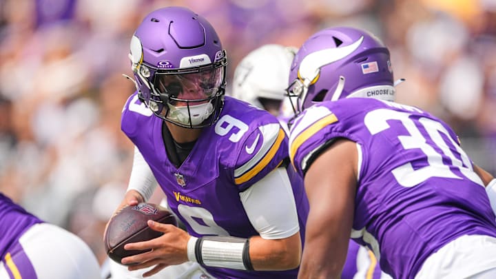 Aug 10, 2024; Minneapolis, Minnesota, USA; Minnesota Vikings quarterback J.J. McCarthy (9) drops back against the Las Vegas Raiders in the first quarter at U.S. Bank Stadium.