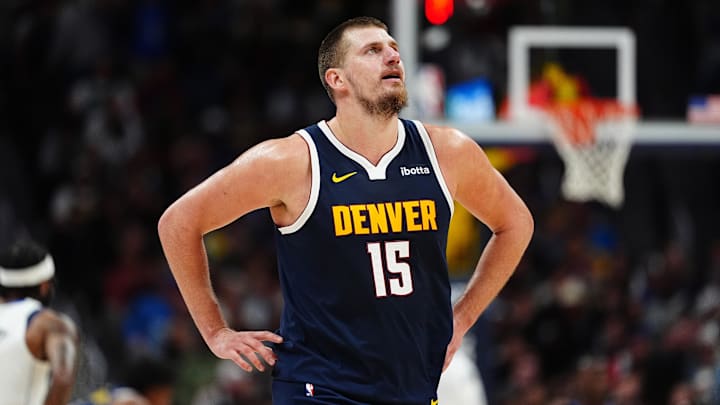 Denver Nuggets center Nikola Jokic (15) reacts in the second half against the Dallas Mavericks at Ball Arena. Mandatory Credit: Ron Chenoy-Imagn Images Denver Nuggets center Nikola Jokic (15) reacts in the second half against the Dallas Mavericks at Ball Arena. Mandatory Credit: Ron Chenoy-Imagn Images