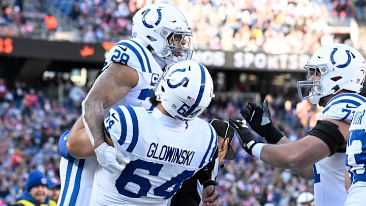 Dec 1, 2024; Foxborough, Massachusetts, USA; Indianapolis Colts running back Jonathan Taylor (28) celebrates a touchdown  during the first half against the New England Patriots at Gillette Stadium. Mandatory Credit: Eric Canha-Imagn Images