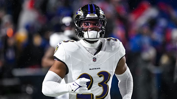Baltimore Ravens linebacker Trenton Simpson enters the field before a game against the Buffalo Bills.