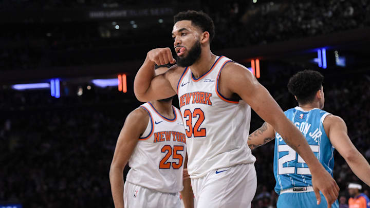 Dec 5, 2024; New York, New York, USA; New York Knicks center Karl-Anthony Towns (32) reacts during the second  half against the Charlotte Hornets at Madison Square Garden. Mandatory Credit: John Jones-Imagn Images