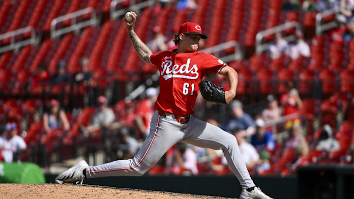 Jun 21, 2025; St. Louis, Missouri, USA;  Cincinnati Reds relief pitcher Chase Petty (61) pitches against the St. Louis Cardinals during the eleventh inning at Busch Stadium. Mandatory Credit: Jeff Curry-Imagn Images
