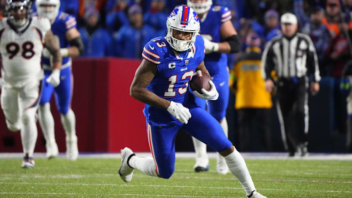 Nov 13, 2023; Orchard Park, New York, USA; Buffalo Bills wide receiver Gabe Davis (13) runs with the ball after making a catch against the Denver Broncos during the second half at Highmark Stadium. Mandatory Credit: Gregory Fisher-Imagn Images
