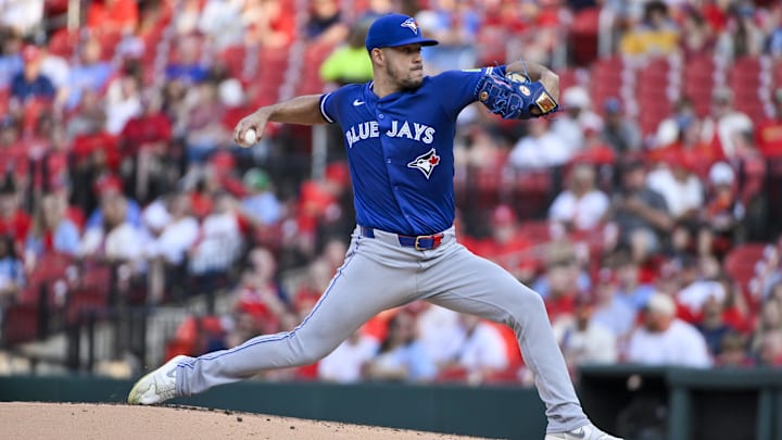 Jun 9, 2025; St. Louis, Missouri, USA;  Toronto Blue Jays starting pitcher Jose Berrios (17) pitches against the St. Louis Cardinals during the first inning at Busch Stadium. 