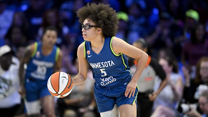 May 14, 2026; Arlington, Texas, USA; Minnesota Lynx guard Olivia Miles (5) brings the ball up court against the Dallas Wings during the first half at College Park Center. Mandatory Credit: Jerome Miron-Imagn Images
