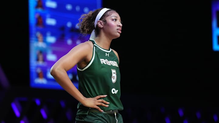 Jan 17, 2025; Miami, FL, USA; Angel Reese (5) of the Rose takes a moment against the Vinyl during a timeout in the first half of the Unrivaled women’s professional 3v3 basketball league at Wayfair Arena. Mandatory Credit: Jim Rassol-Imagn Images