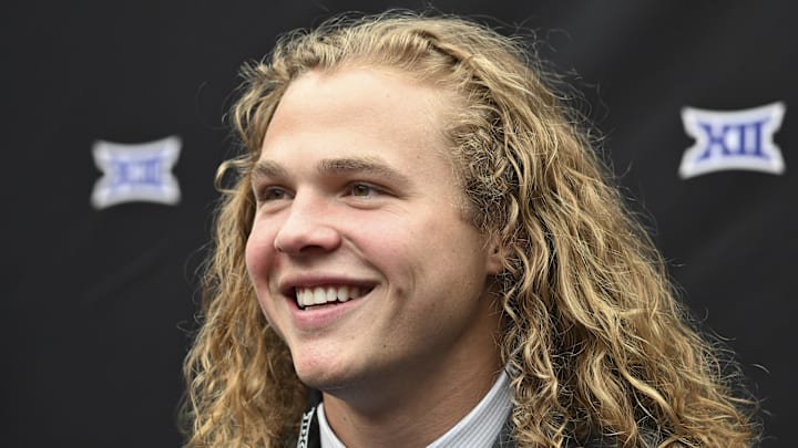Jul 9, 2024; Las Vegas, NV, USA; Kansas State quarterback Avery Johnson speaks to the media during the Big 12 Media Days at Allegiant Stadium. Mandatory Credit: Candice Ward-Imagn Images Jul 9, 2024; Las Vegas, NV, USA; Kansas State quarterback Avery Johnson speaks to the media during the Big 12 Media Days at Allegiant Stadium. Mandatory Credit: Candice Ward-Imagn Images