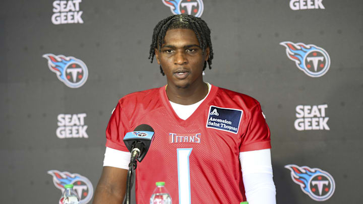 May 10, 2025; Nashville, TN, USA;  Tennessee Titans quarterback Cam Ward (1) talks with reporters after his first day of rookie mini camp  at Saint Thomas Sports Park. Mandatory Credit: Steve Roberts-Imagn Images