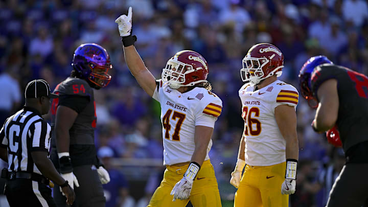 Nov 8, 2025; Fort Worth, Texas, USA; Iowa State Cyclones linebacker Kooper Ebel (47) and linebacker Caleb Bacon (26) celebrates a defensive stop against the TCU Horned Frogs during the first half at Amon G. Carter Stadium. Mandatory Credit: Jerome Miron-Imagn Images