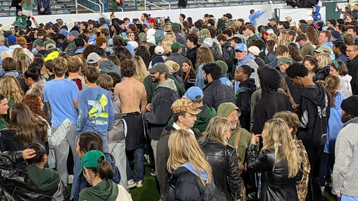 Tulane Fans Mingle on the Field after AAC Championship Victory Tulane Fans Mingle on the Field after AAC Championship Victory