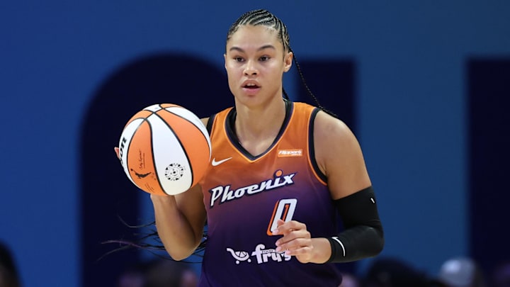Jul 3, 2025; Arlington, Texas, USA;  Phoenix Mercury forward Satou Sabally (0) dribbles against the Dallas Wings during the second half at College Park Center. Mandatory Credit: Kevin Jairaj-Imagn Images