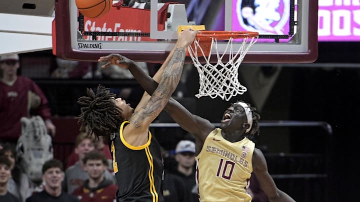 Jan 15, 2025; Tallahassee, Florida, USA; Florida State Seminoles forward Taylor Bol Bowen (10) blocks a shot by Pittsburgh Panthers forward Cameron Corhen (2) during the second half at Donald L. Tucker Center. Mandatory Credit: Melina Myers-Imagn Images
