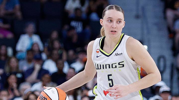Paige Bueckers dribbles the ball during a Dallas Wings game. Paige Bueckers dribbles the ball during a Dallas Wings game.