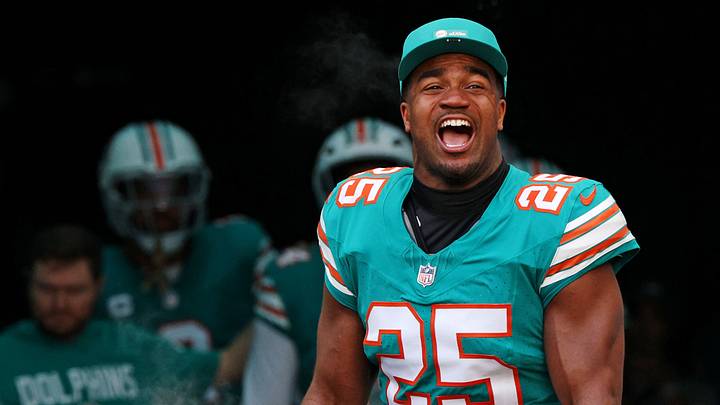 Dec 21, 2025; Miami Gardens, Florida, USA; Miami Dolphins linebacker Tyrel Dodson (25) runs on the field at the start of the game against the Cincinnati Bengals at Hard Rock Stadium. Mandatory Credit: Nathan Ray Seebeck-Imagn Images