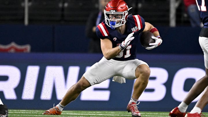 Jan 30, 2025; Arlington, TX, USA; East wide receiver Efton Chism of Eastern Washington (81) runs with the ball during the first half against the West at AT&T Stadium. Mandatory Credit: Jerome Miron-Imagn Images Jan 30, 2025; Arlington, TX, USA; East wide receiver Efton Chism of Eastern Washington (81) runs with the ball during the first half against the West at AT&T Stadium. Mandatory Credit: Jerome Miron-Imagn Images