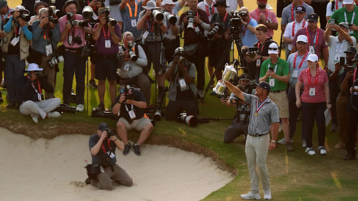 Bryson DeChambeau celebrates with the trophy after winning the 2024 U.S. Open. Bryson DeChambeau celebrates with the trophy after winning the 2024 U.S. Open.