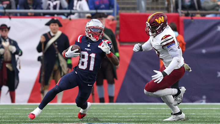 Nov 5, 2023; Foxborough, Massachusetts, USA; New England Patriots receiver Demario Douglas (81) runs the ball during the second half against the Washington Commanders at Gillette Stadium. Mandatory Credit: Paul Rutherford-USA TODAY Sports