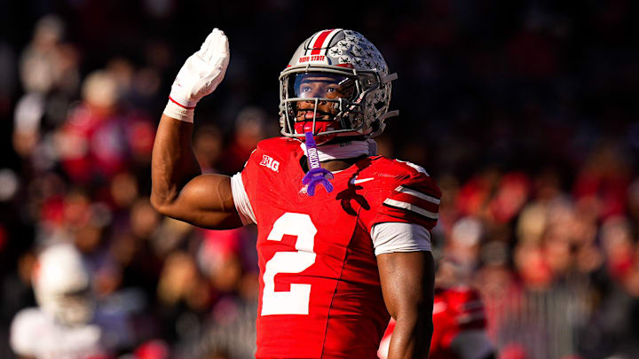 Ohio State Buckeyes defensive back Caleb Downs (2) celebrates after sacking Rutgers Scarlet Knights quarterback Athan Kaliakmanis (16) in the second half of the NCAA football game at Ohio Stadium on Saturday, Nov. 22, 2025 in Columbus, Ohio.