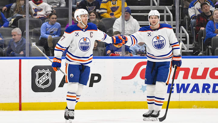 Edmonton Oilers center Connor McDavid is congratulated by left wing Zach Hyman after scoring against the St. Louis Blues