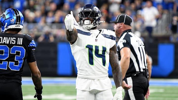 Sep 30, 2024; Detroit, Michigan, USA; Seattle Seahawks wide receiver DK Metcalf (14) celebrates against the Detroit Lions in the first quarter at Ford Field. Mandatory Credit: Eamon Horwedel-Imagn Images