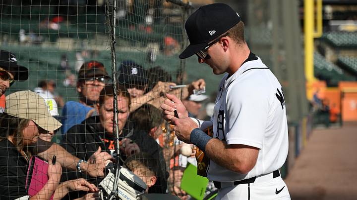 Detroit Tigers third baseman Kevin McGonigle (7) signs autographs for fans before their game. Detroit Tigers third baseman Kevin McGonigle (7) signs autographs for fans before their game.