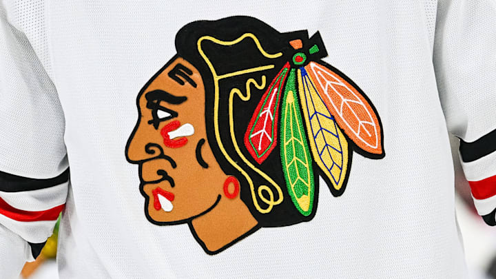 Feb 14, 2023; Montreal, Quebec, CAN; View of a Chicago Blackhawks logo on a jersey worn by a member of the team against the Montreal Canadiens during the third period at Bell Centre. Mandatory Credit: David Kirouac-Imagn Images