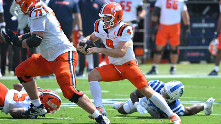 Sep 6, 2025; Durham, North Carolina, USA;  Illinois Fighting Illini quarterback Luke Altmyer (9) runs during the first quarter against the Duke Blue Devils at Wallace Wade Stadium. Mandatory Credit: Zachary Taft-Imagn Images