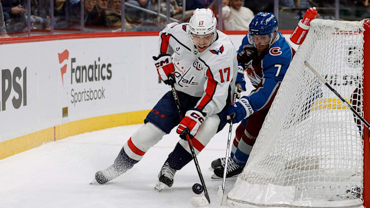 Nov 15, 2024; Denver, Colorado, USA; Washington Capitals center Dylan Strome (17) and Colorado Avalanche defenseman Devon Toews (7) battle for the puck in the third period at Ball Arena. Mandatory Credit: Isaiah J. Downing-Imagn Images Nov 15, 2024; Denver, Colorado, USA; Washington Capitals center Dylan Strome (17) and Colorado Avalanche defenseman Devon Toews (7) battle for the puck in the third period at Ball Arena. Mandatory Credit: Isaiah J. Downing-Imagn Images