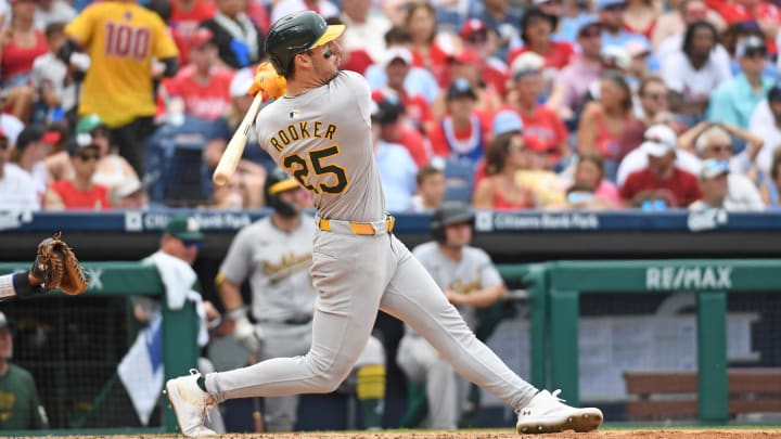 Jul 14, 2024; Philadelphia, Pennsylvania, USA; Oakland Athletics outfielder Brent Rooker (25) hits a two-run home run against the Philadelphia Phillies during the sixth inning at Citizens Bank Park. Jul 14, 2024; Philadelphia, Pennsylvania, USA; Oakland Athletics outfielder Brent Rooker (25) hits a two-run home run against the Philadelphia Phillies during the sixth inning at Citizens Bank Park.