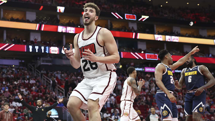 Mar 23, 2025; Houston, Texas, USA; Houston Rockets center Alperen Sengun (28) reacts after a play during the second quarter against the Denver Nuggets at Toyota Center. Mandatory Credit: Troy Taormina-Imagn Images