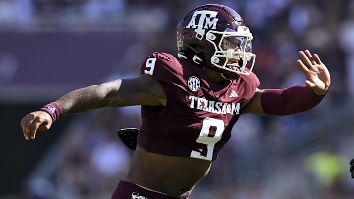 Texas A&M Aggies defensive end Cashius Howell (9) defends in coverage against the Auburn Tigers during the first half at Kyle Field.