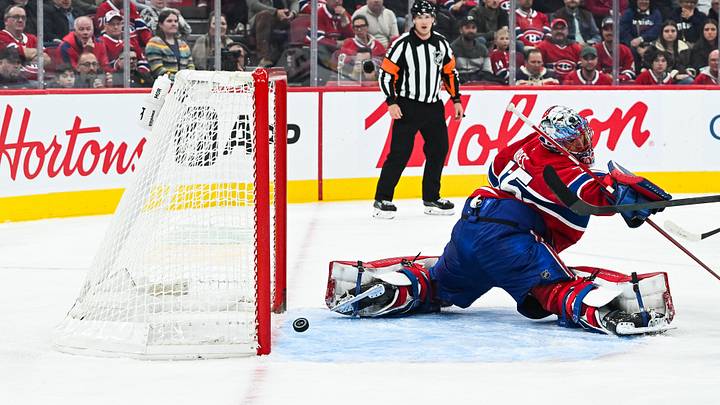 Oct 20, 2026; Montreal, Quebec, CAN;  San Jose Sharks center Tyler Toffoli (73) (not pictured) scores a goal against Montreal Canadiens goalie Jakub Dobes (75) during the third period at Bell Centre.  Mandatory Credit: David Kirouac-Imagn Images