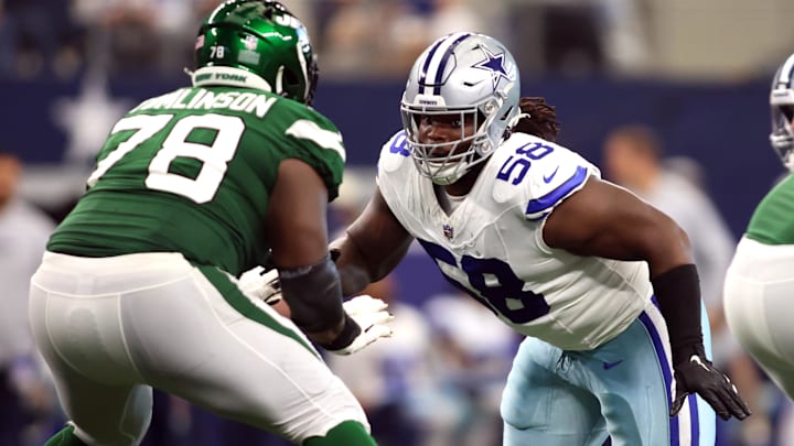 Dallas Cowboys defensive tackle Mazi Smith rushes the passer while blocked by New York Jets guard Laken Tomlinson. Dallas Cowboys defensive tackle Mazi Smith rushes the passer while blocked by New York Jets guard Laken Tomlinson.
