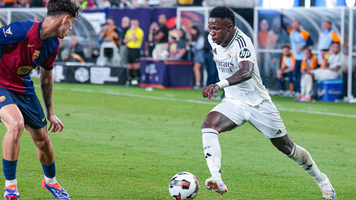Aug 3, 2024; East Rutherford, NJ, USA; Real Madrid forward Vinicius Junior (7) in action during the second half against Barcelona at MetLife Stadium. Mandatory Credit: Vincent Carchietta-Imagn Images Aug 3, 2024; East Rutherford, NJ, USA; Real Madrid forward Vinicius Junior (7) in action during the second half against Barcelona at MetLife Stadium. Mandatory Credit: Vincent Carchietta-Imagn Images