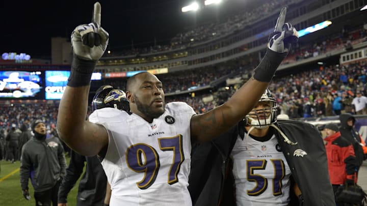 Jan 20, 2013; Foxboro, MA, USA; Baltimore Ravens defensive end Arthur Jones (97) celebrates with safety Brendan Ayanbadejo (51) in the fourth quarter against the New England Patriots in the AFC championship game at Gillette Stadium. The Ravens defeated the Patriots 28-13. Mandatory Credit: Kirby Lee/Imagn Images Jan 20, 2013; Foxboro, MA, USA; Baltimore Ravens defensive end Arthur Jones (97) celebrates with safety Brendan Ayanbadejo (51) in the fourth quarter against the New England Patriots in the AFC championship game at Gillette Stadium. The Ravens defeated the Patriots 28-13. Mandatory Credit: Kirby Lee/Imagn Images