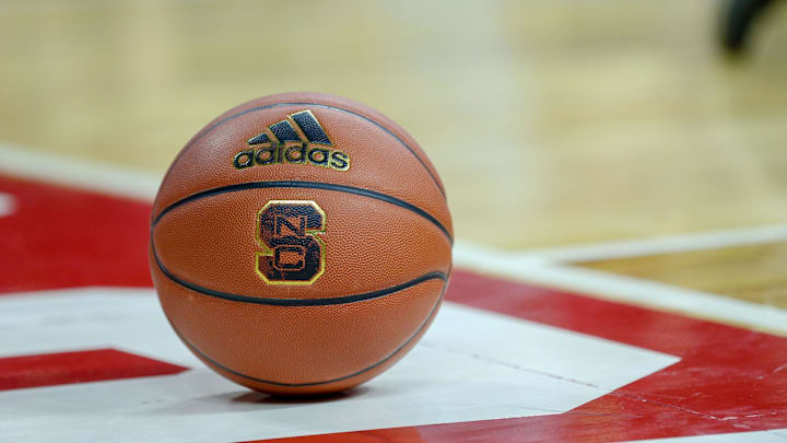 Feb 20, 2019; Raleigh, NC, USA; Basketball with the North Carolina State Wolfpack logo sits on the court during a timeout as the Wolfpack play the Boston College Eagles in the first half at PNC Arena. The North Carolina State Wolfpack won 89-80. Mandatory Credit: Nell Redmond-Imagn Images Feb 20, 2019; Raleigh, NC, USA; Basketball with the North Carolina State Wolfpack logo sits on the court during a timeout as the Wolfpack play the Boston College Eagles in the first half at PNC Arena. The North Carolina State Wolfpack won 89-80. Mandatory Credit: Nell Redmond-Imagn Images