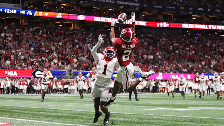 Dec 6, 2025; Atlanta, GA, USA; Alabama Crimson Tide wide receiver Ryan Williams (2) attempts to make a catch as Georgia Bulldogs defensive back Ellis Robinson IV (1) defends during the fourth quarter during the 2025 SEC Championship game at Mercedes-Benz Stadium. Mandatory Credit: Brett Davis-Imagn Images