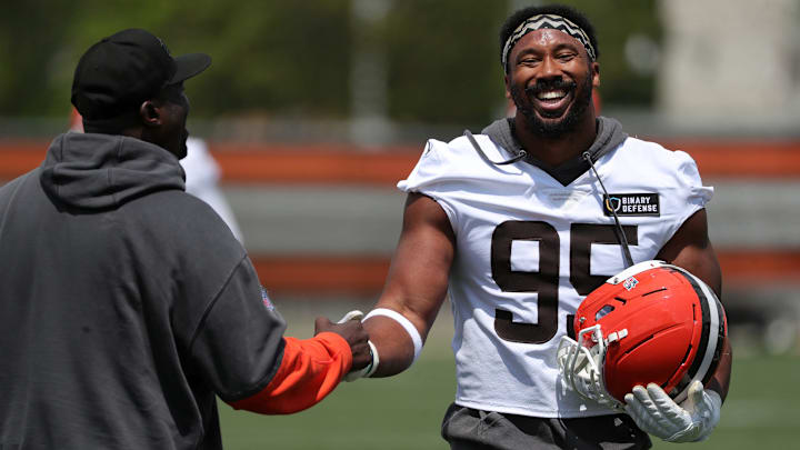 Browns defensive end Myles Garrett has a moment with defensive line coach Jacques Cesaire during practice at minicamp, Tuesday, June 10, 2025, in Berea. Browns defensive end Myles Garrett has a moment with defensive line coach Jacques Cesaire during practice at minicamp, Tuesday, June 10, 2025, in Berea.