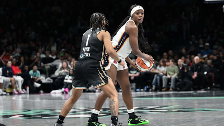 Apr 25, 2026; Brooklyn, NY, USA; Indiana Fever guard Raven Johnson (3) sets the play while defended by New York Liberty guard Ny'ceara Pryor (1) during the first half at Barclays Center. Mandatory Credit: John Jones-Imagn Images