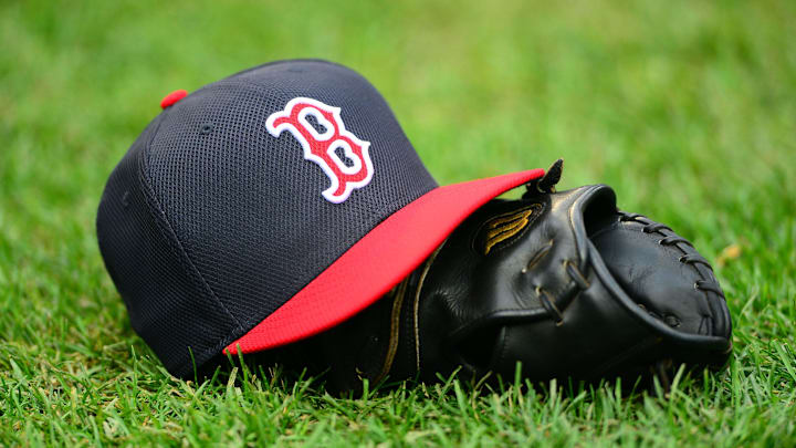 Oct 15, 2013; Detroit, MI, USA; A Boston Red Sox hat and glove on the field prior to game three of the American League Championship Series baseball game against the Detroit Tigers at Comerica Park. Mandatory Credit: Andrew Weber-Imagn Images Oct 15, 2013; Detroit, MI, USA; A Boston Red Sox hat and glove on the field prior to game three of the American League Championship Series baseball game against the Detroit Tigers at Comerica Park. Mandatory Credit: Andrew Weber-Imagn Images